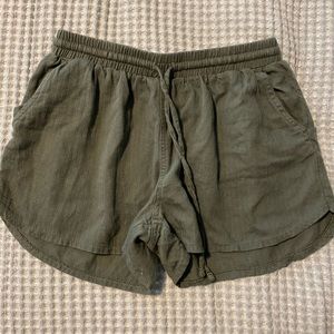 green shorts